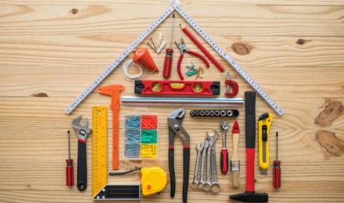 Why is it important to know where structural beams are before redesigning a room?